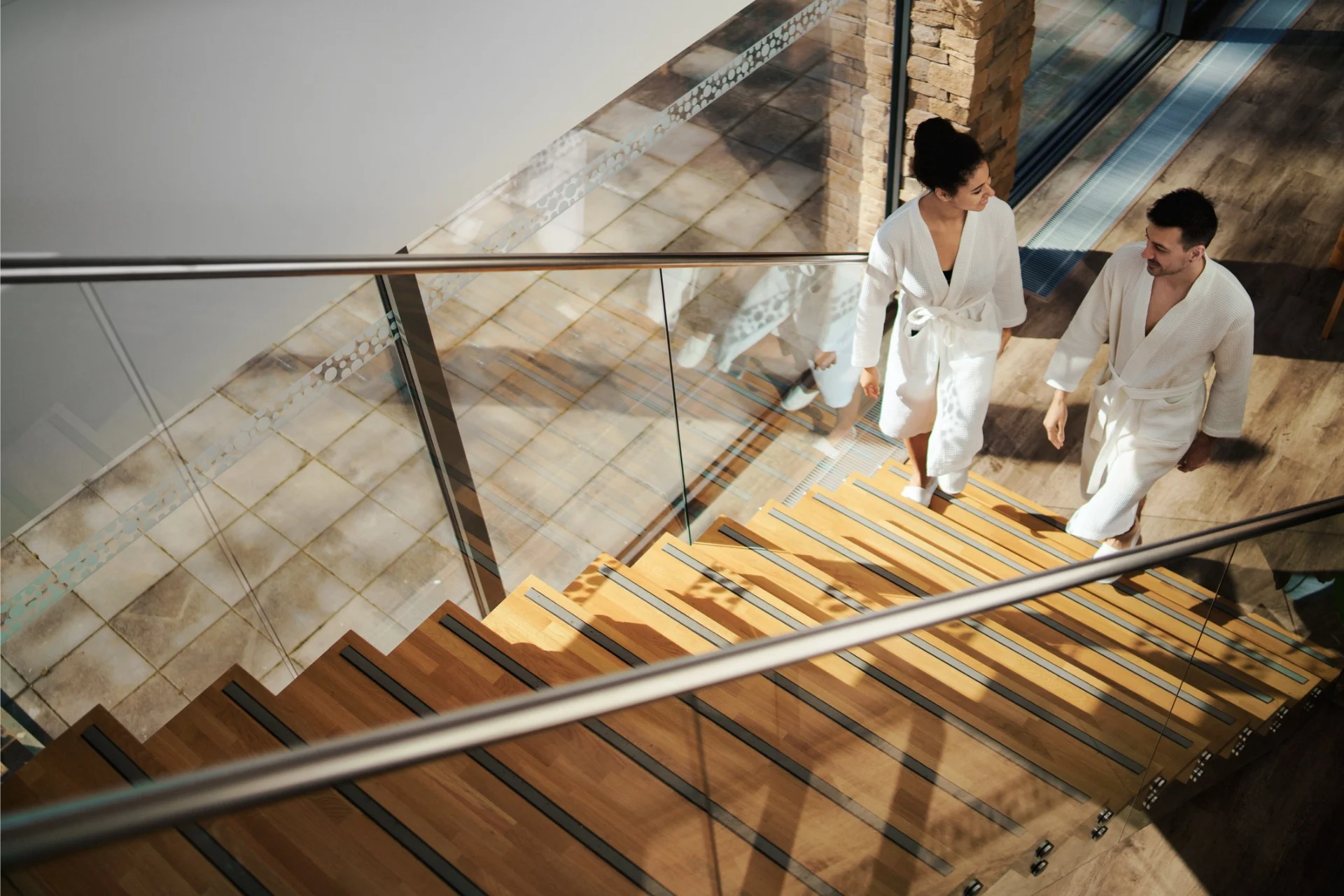 guest experience couple walking to spa appointment at hotel